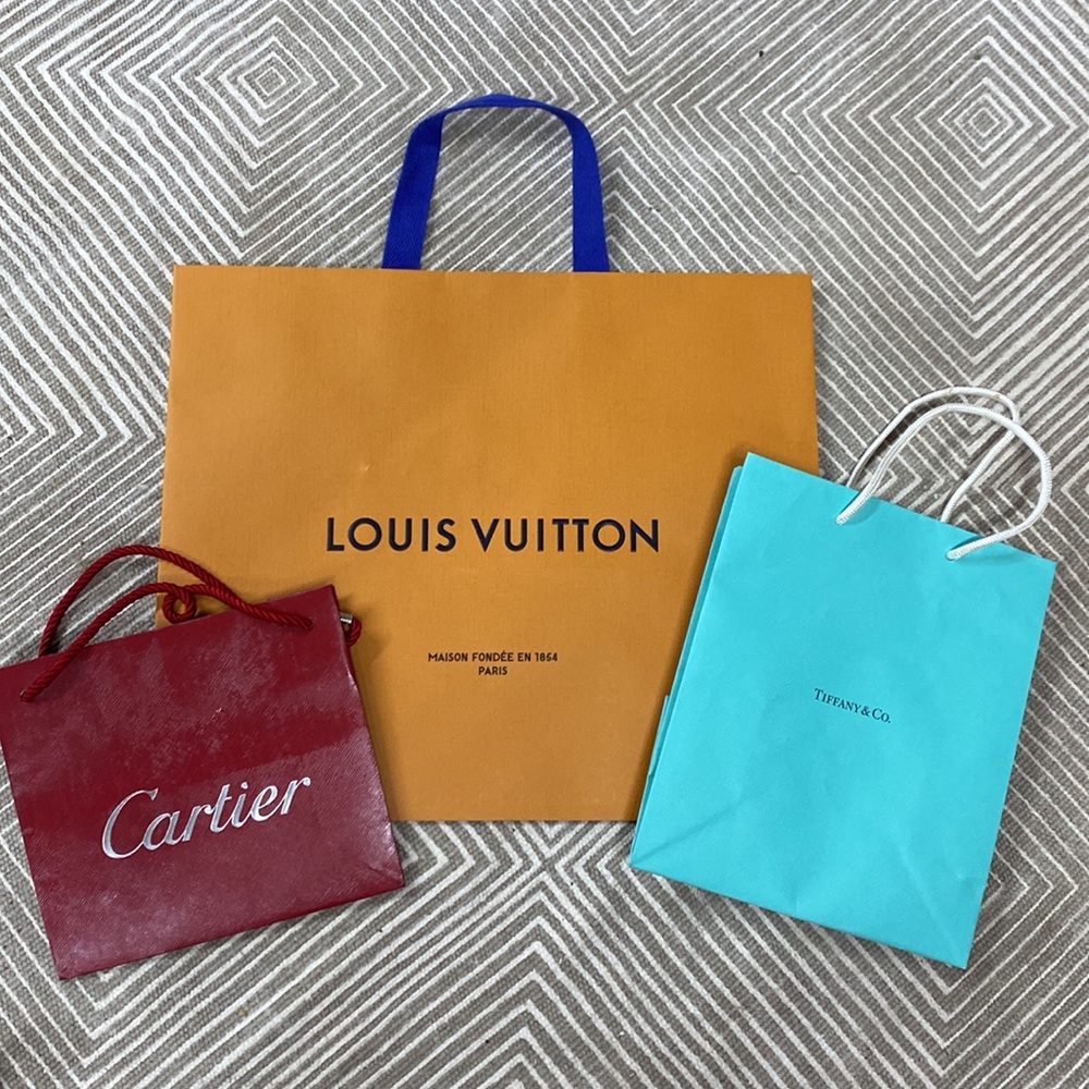 Set of shopping paper bags Vuitton Cartier Tiffany